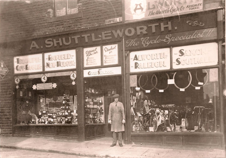 Alec Shuttleworth standing outside his shop